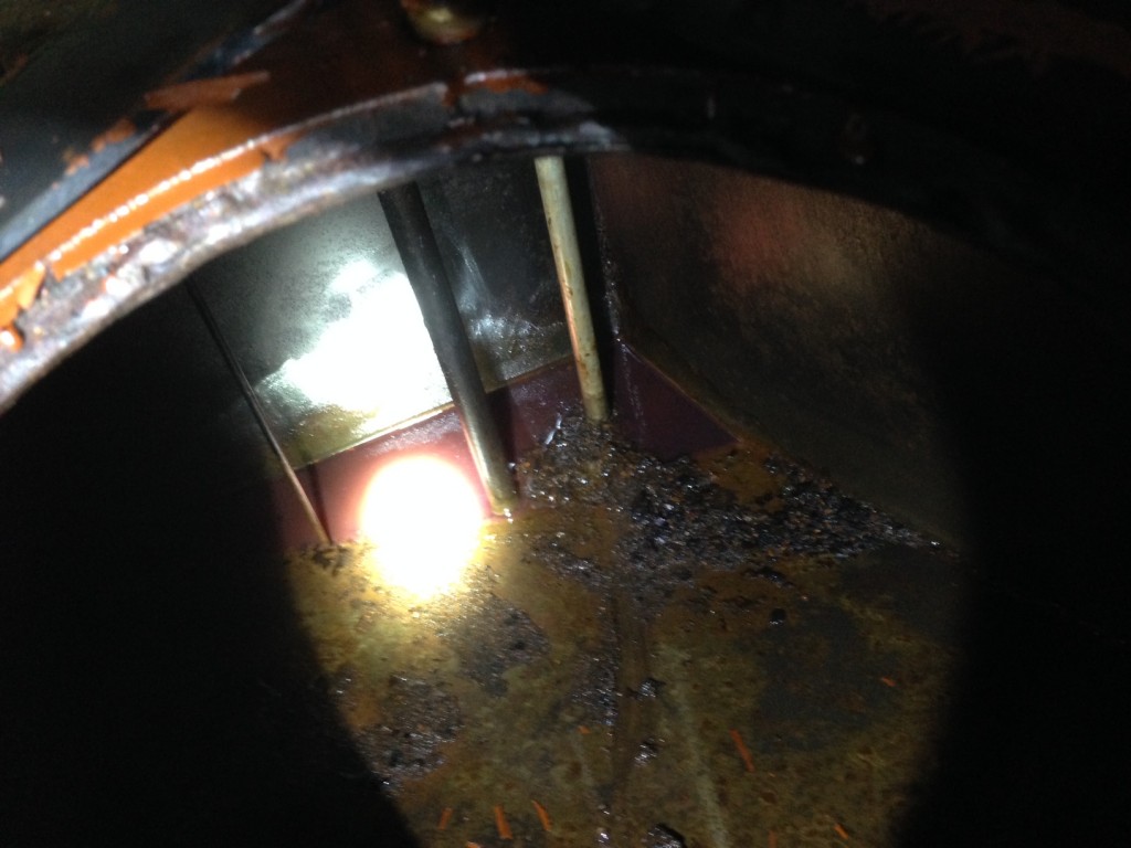 Debris at bottom of tank after removing the diesel